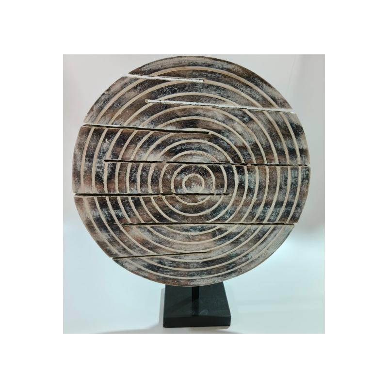 wooden carved object with black marble base